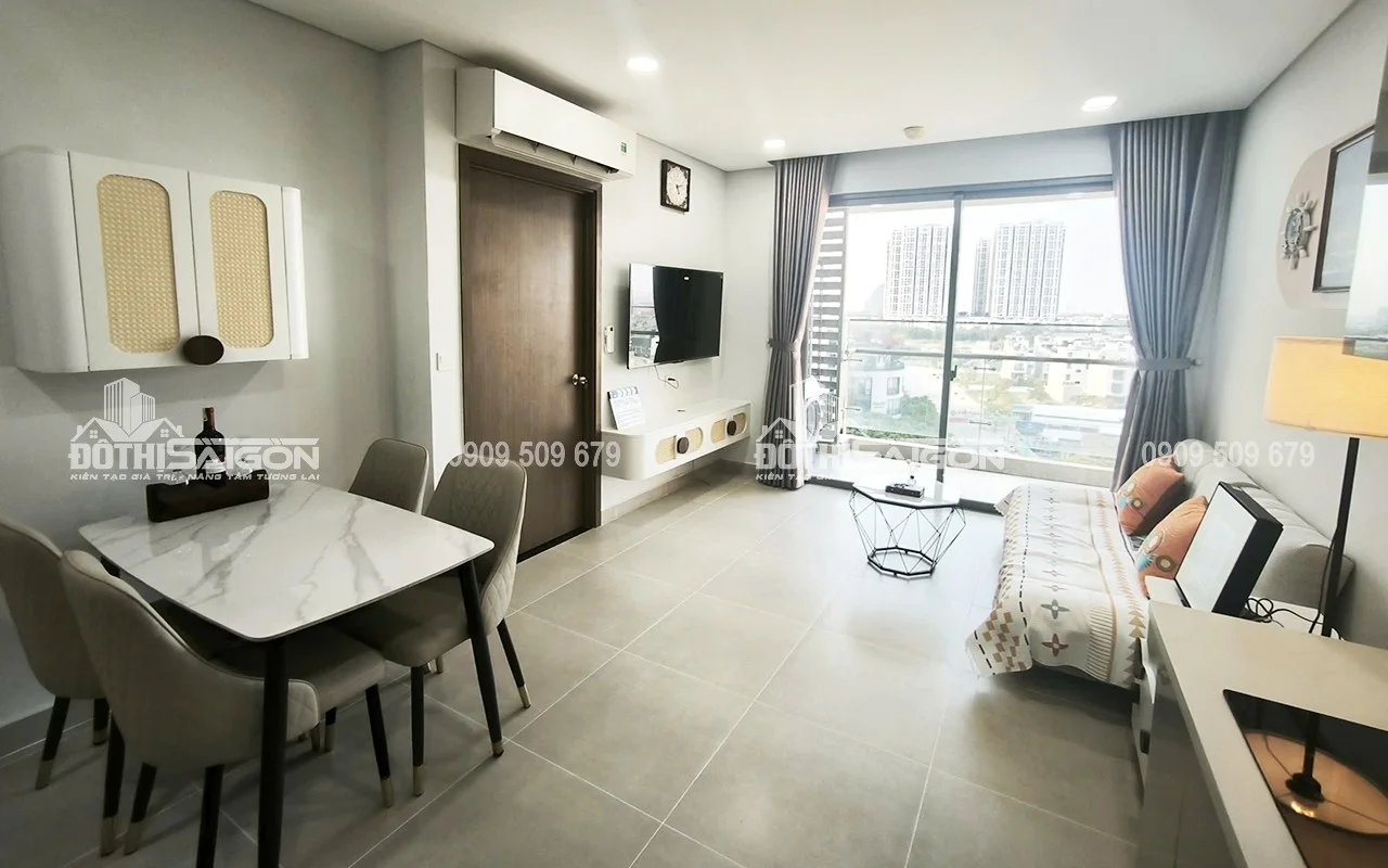 Căn hộ kính cong panorama nhìn ra sông với ánh sáng tự nhiên tràn vào phòng khách